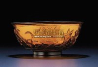 A TRANSLUCENT CARVED AMBER GLASS BOWL -  - 重要中国瓷器及工艺精品 - 2011年春季拍卖会 -收藏网