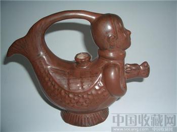 北宋 磁州窖(疑为北宋耀州系)酱釉孩儿提梁壶-收藏网