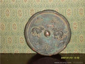 宋袋鼠花卉纹饰铜镜-收藏网