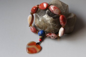 南红玛瑙随形椭圆珠手珠-收藏网